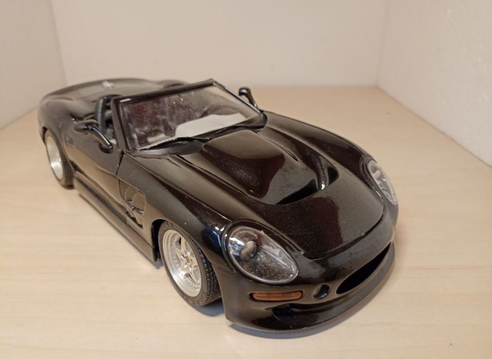 Shelby series1 
Scara 1:18
Bburago 

Pozele reflectă realitatea. Se vi