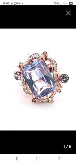 inel aur roz 9k greutate 10grame cu piatra Topaz 13x18mm masura 55EU