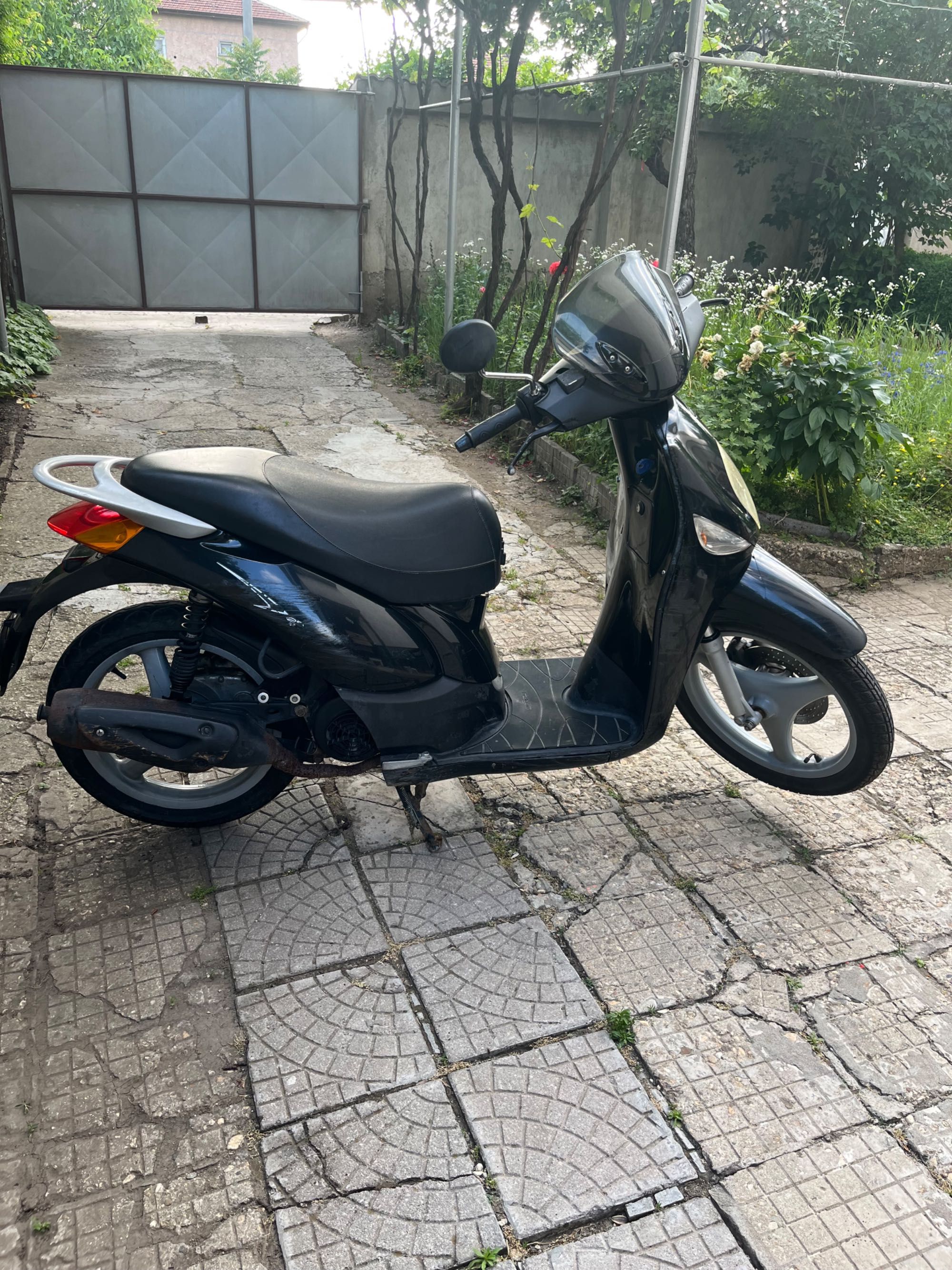 Скутер 125 кубика