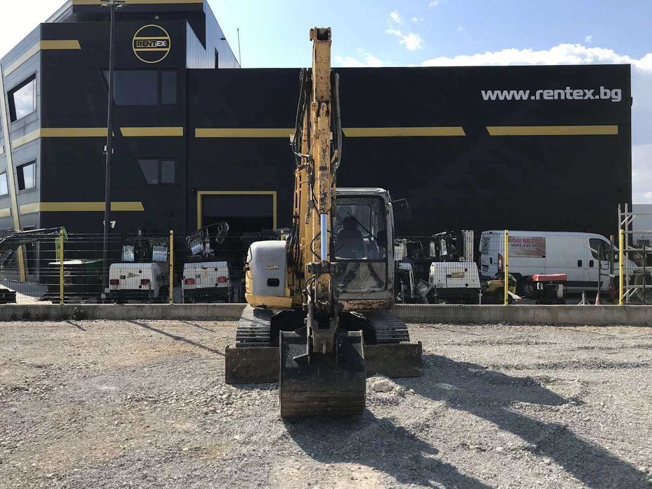 Багер New Holland Kobelco E70SR-1ES 8000кг