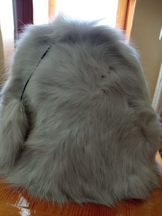 Продам детскую зимнюю шапку