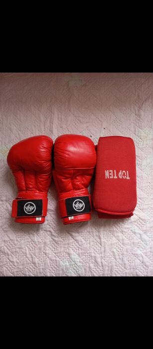 Продам спорт кастюм и перчатки и футы 9-12 лет покупайте