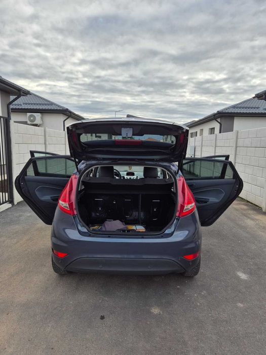 Ford Fiesta, 4 usi, 1,6l, 2011, 96 cp