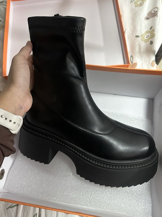 Новые сапоги.