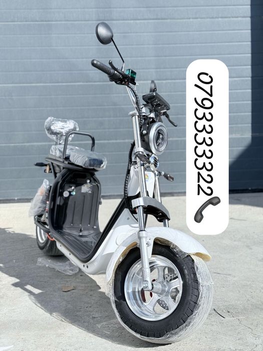 Scuter electric cu cartela