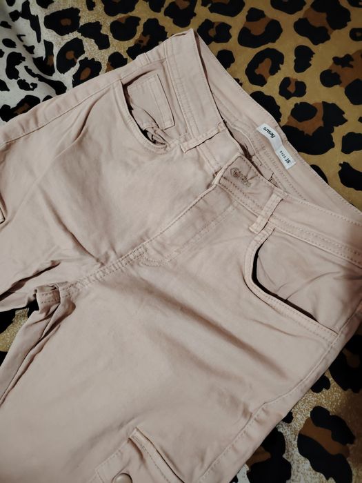 Pantaloni femei roz Sinsay