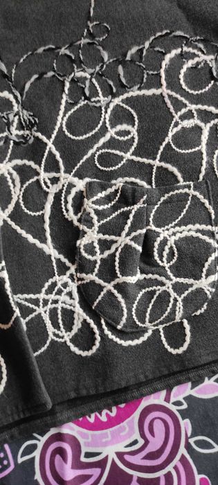 Късо палто тип пеперуда и черно сако.