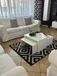 Set canapele albe ,masuta,covoare,draperii