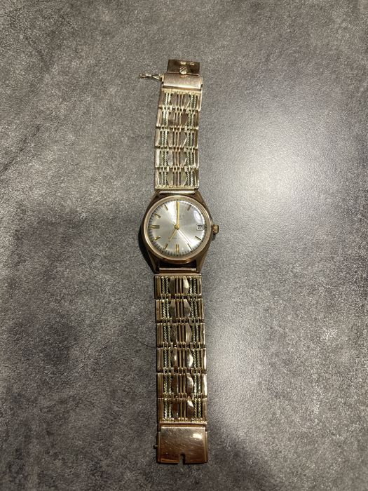 часы золотые наручные