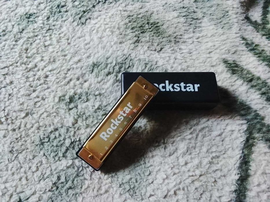 Продам новую детскую губную гармонику Rockstar. Недорого,