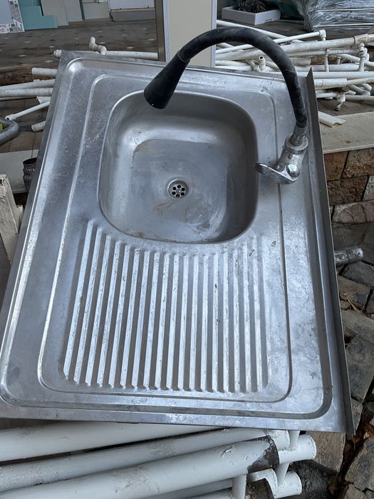 Раковина кухняга смисителлари билан калория фирмаси