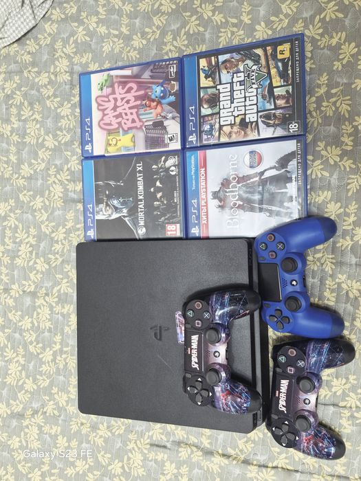 Пс4 слим на террабайт в отличном состоянии но бу 4 игр на фоне