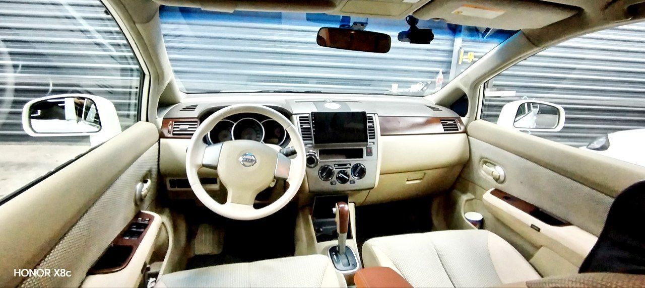 Nissan tiida 1.8 2008 йил холати идеалний