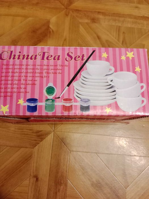 Детский игрушечный чайный керамический сервиз на 4-х персон.