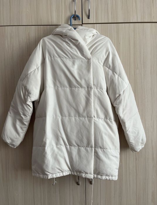 Женский пуховик.