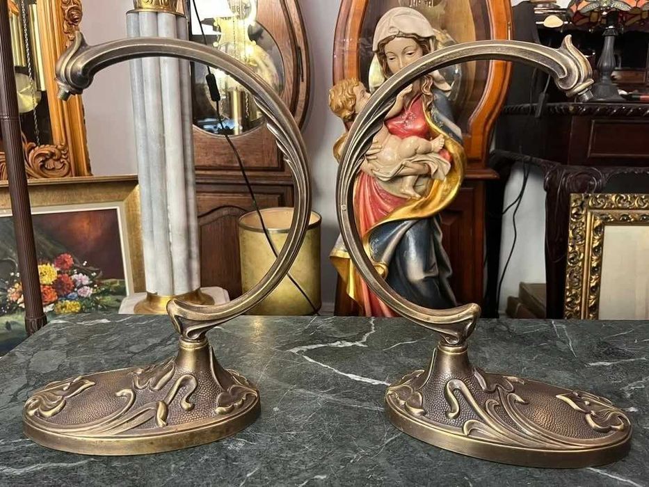 2 suporți din bronz pentru un proiect