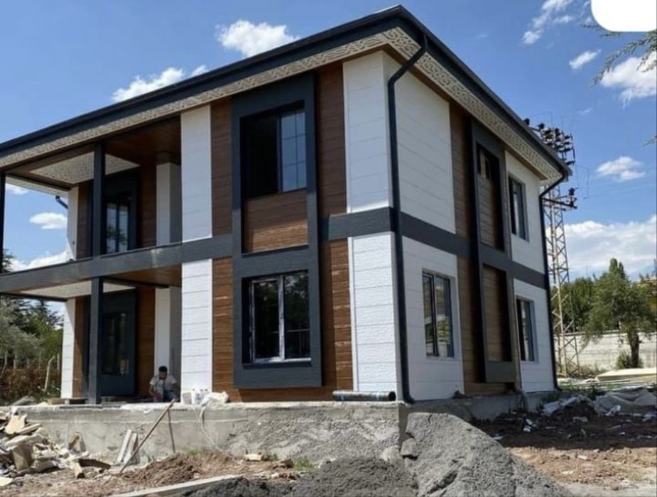 Producatori de case pe structura metalica invelite cu panou sandwich