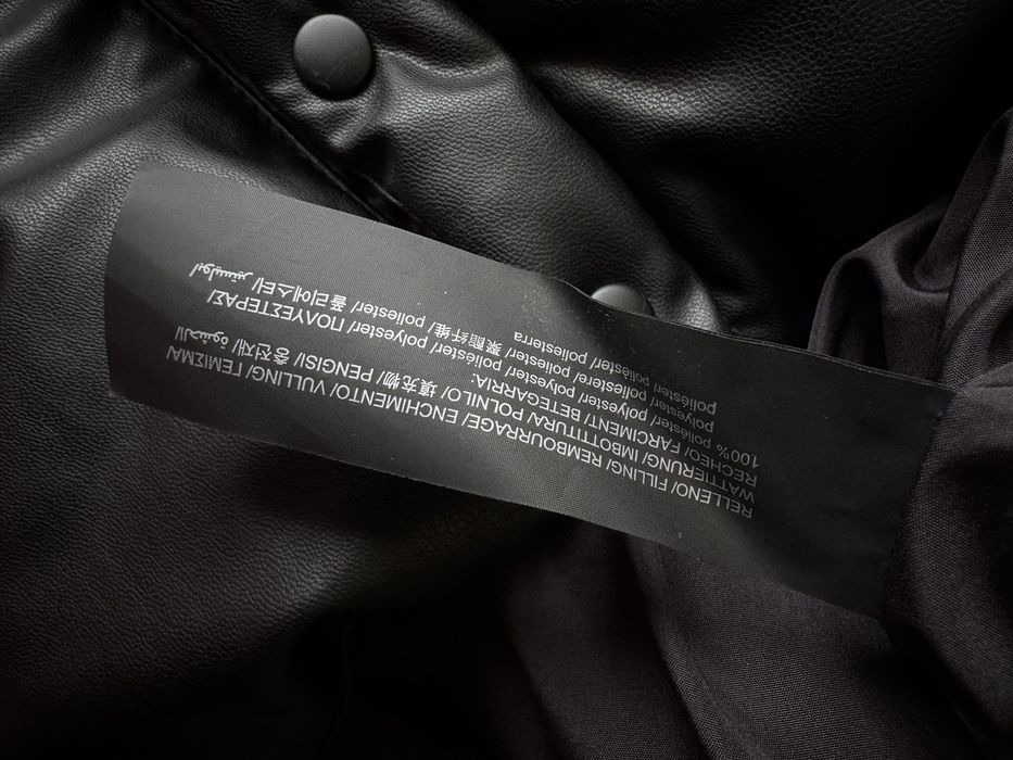 Vesta lunga de piele