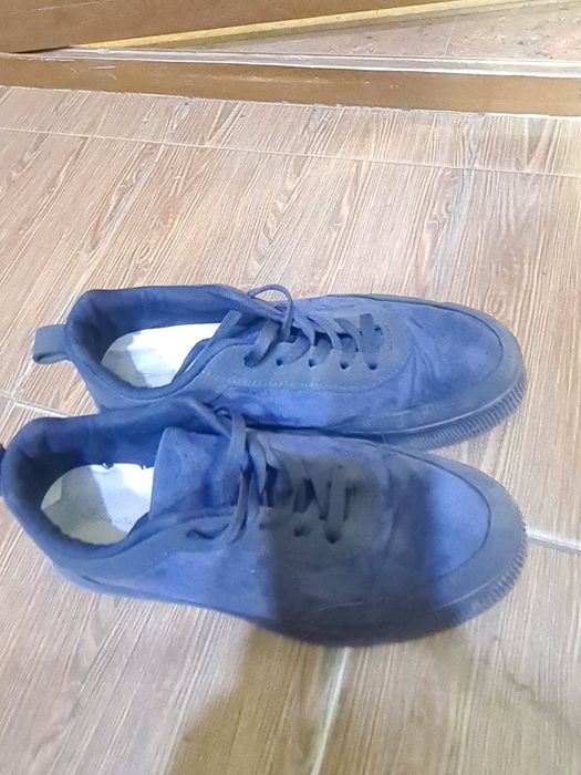 Santoni guanjo òrtacha sifat