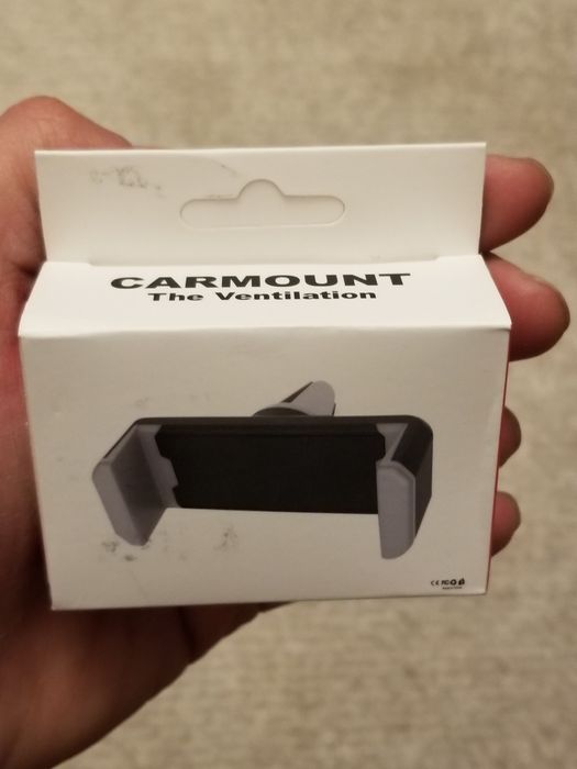 Suport universal telefon_prindere pe grila de ventilatie a masinii