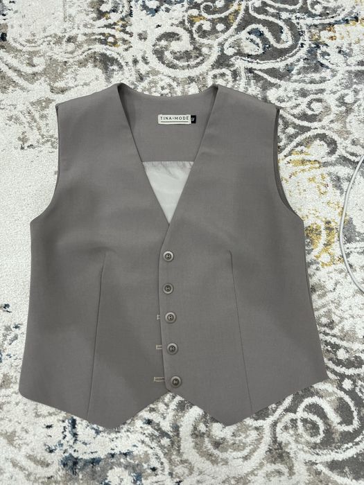 Жилет, женская одежда