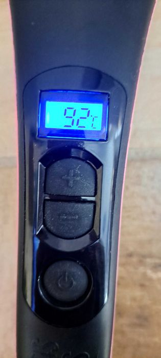 Електрическа четка за изправяне на коса.