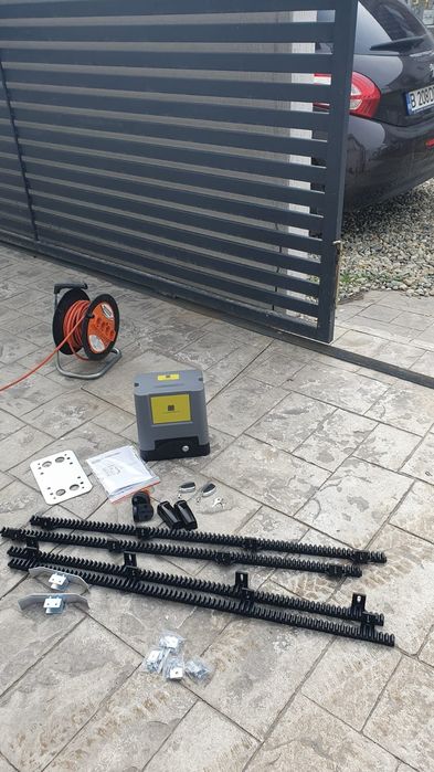 Montaj poarta automata culisanta porti batante