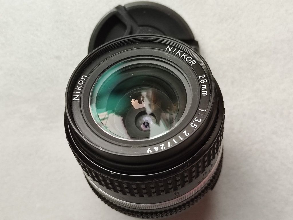 Vand Nikon Nikkor 28mm f3.5 Ais, focus manual