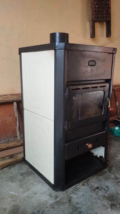 Vând termosemineu pe lemne cu pompa