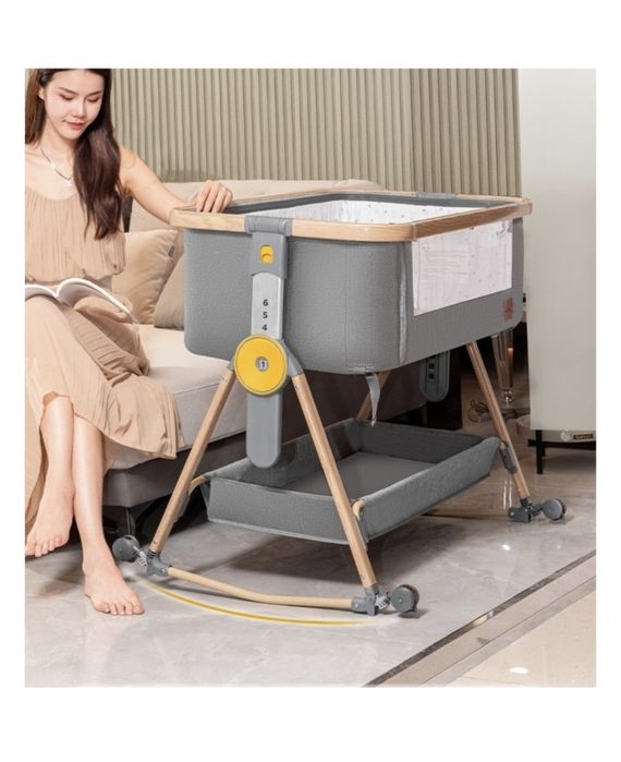 Манеж-кровать с регулировкой высоты, на колесиках