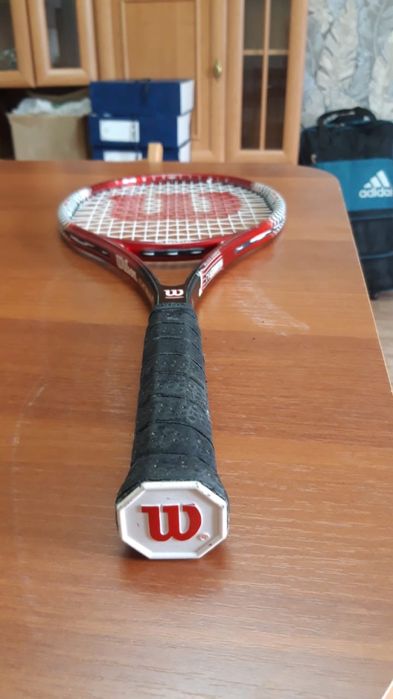 Теннисная ракетка