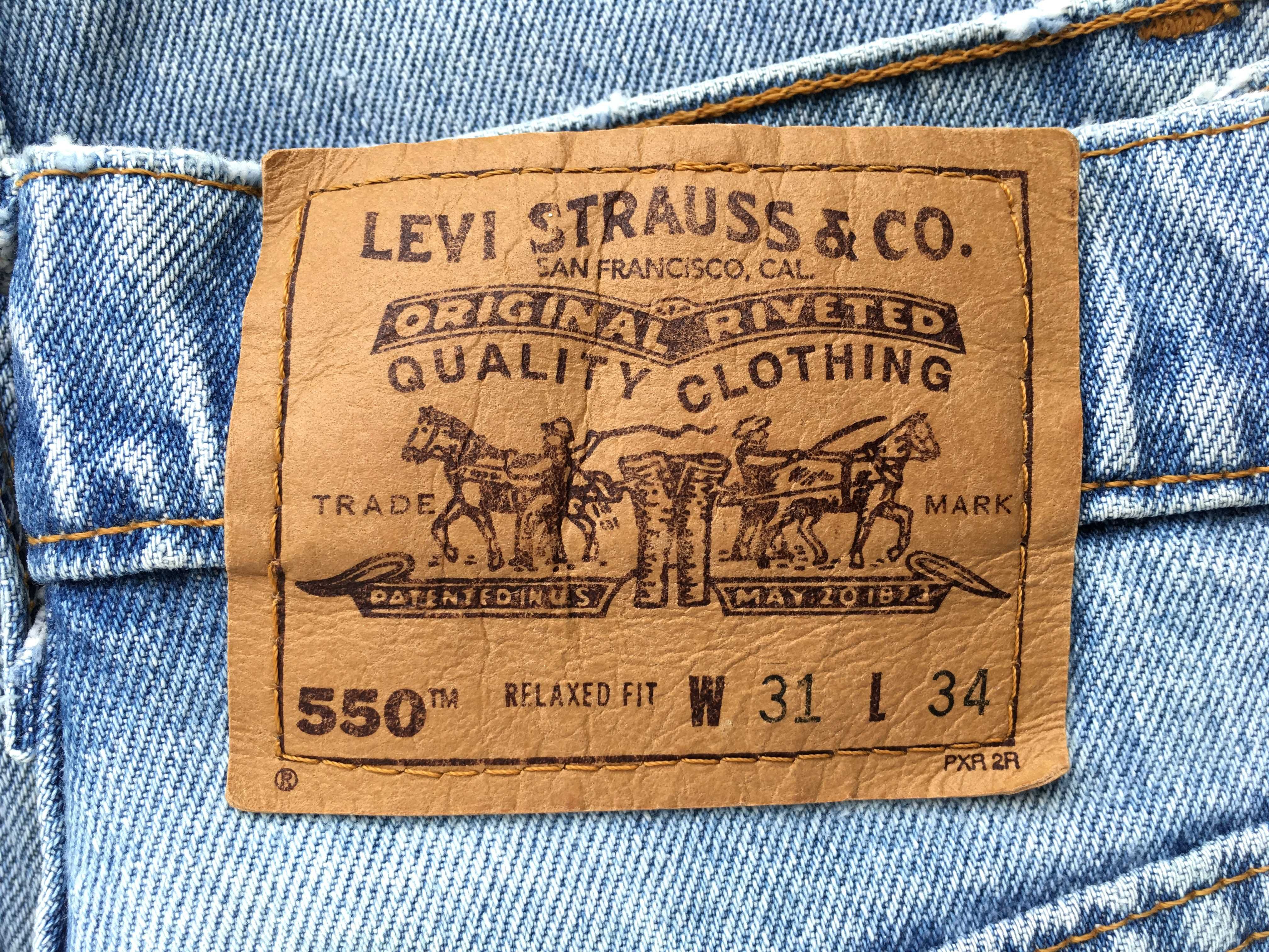 VINTAGE 1997 Made in U.S.A. LEVI'S® 550™ Orange Tab™ Jeans — W31 L32