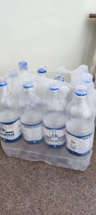 1л пласт. бутылки в упаковке с крышками