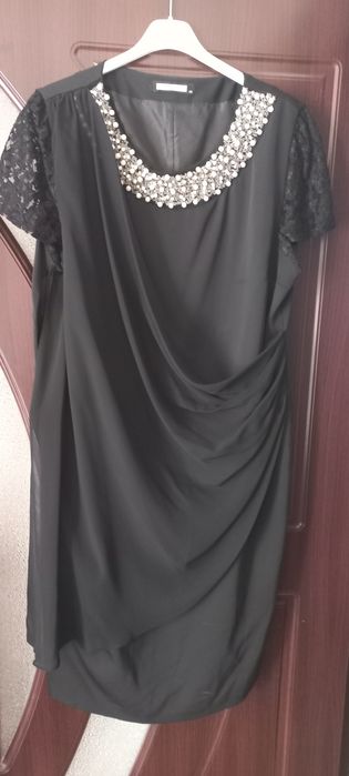 Vând rochite elegante masura 48