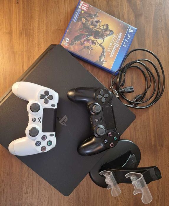PS4 Slim 500GB + 2 manete + Mortal Kombat 11 + suport

încărcare
