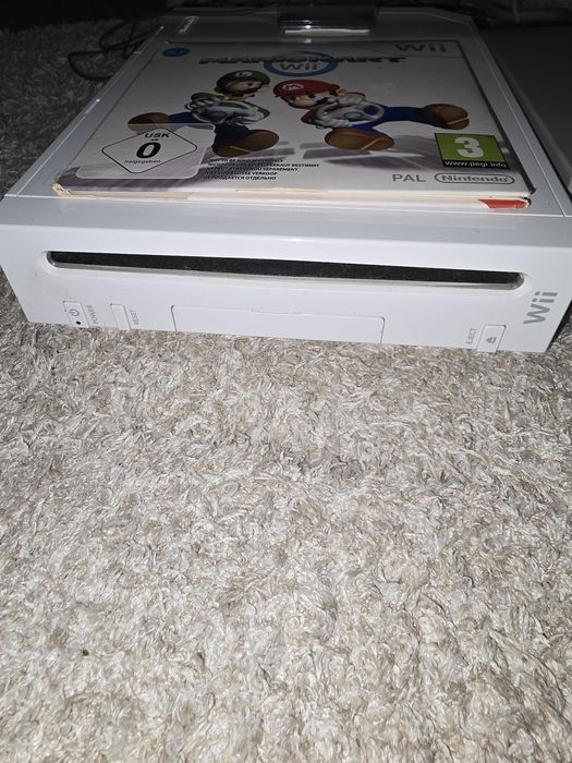 Consola Nintendo Wii + 2 jocuri + telecomanda motion