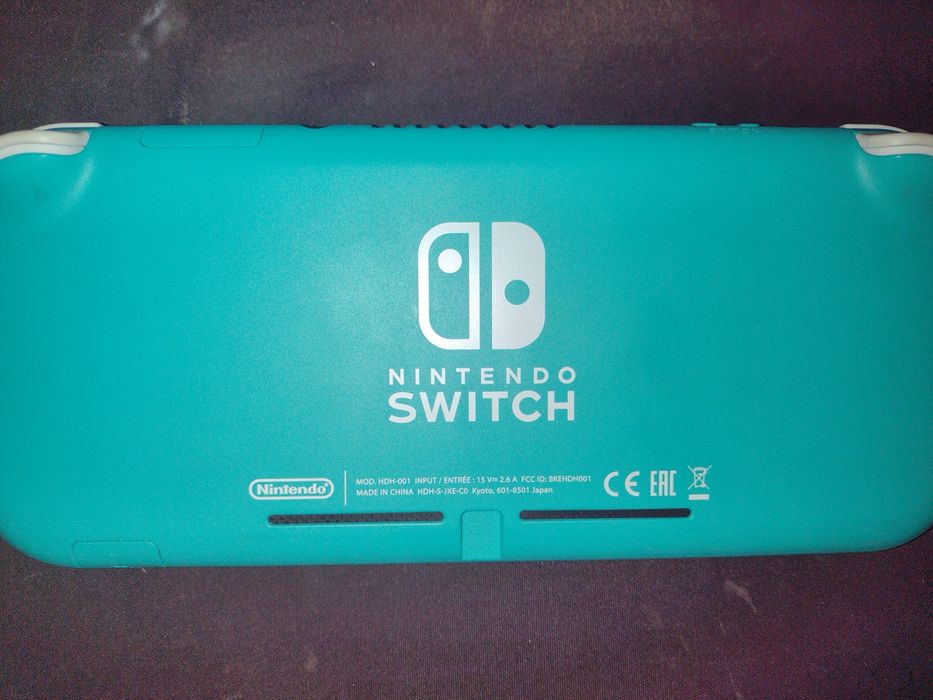 Nintendo Switch Lite Циан 12 игри + подарък