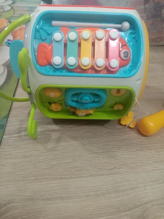 Музыкальная, развивающая  игрушка
