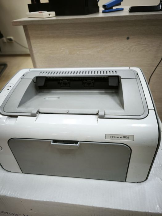 Принтер офисный HP P1102