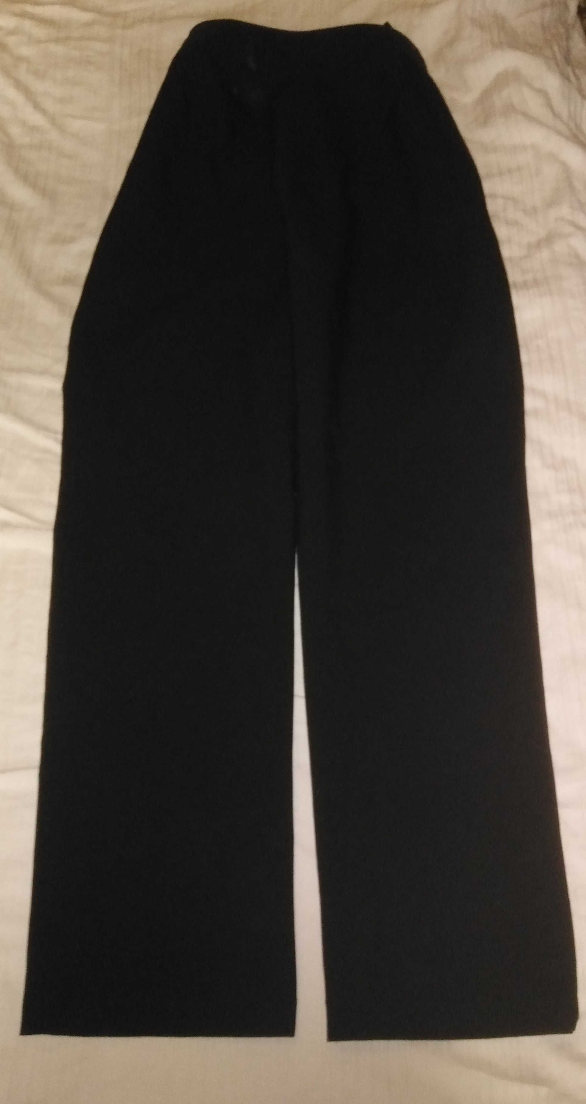 Pantaloni negri de la U C of Benetton, model foarte frumos