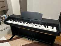 Pian digital Roland RP102