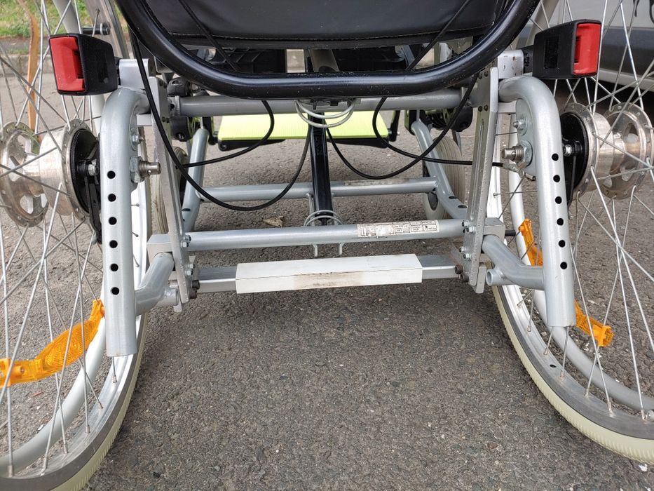 Scaun rulant neurologic,rabatabil,reglabila hidraulic.