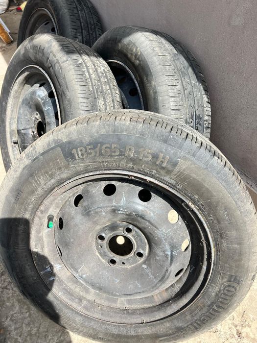 Jante 4x100+anvelope continental 185 65 r15 (Dacia Logan)