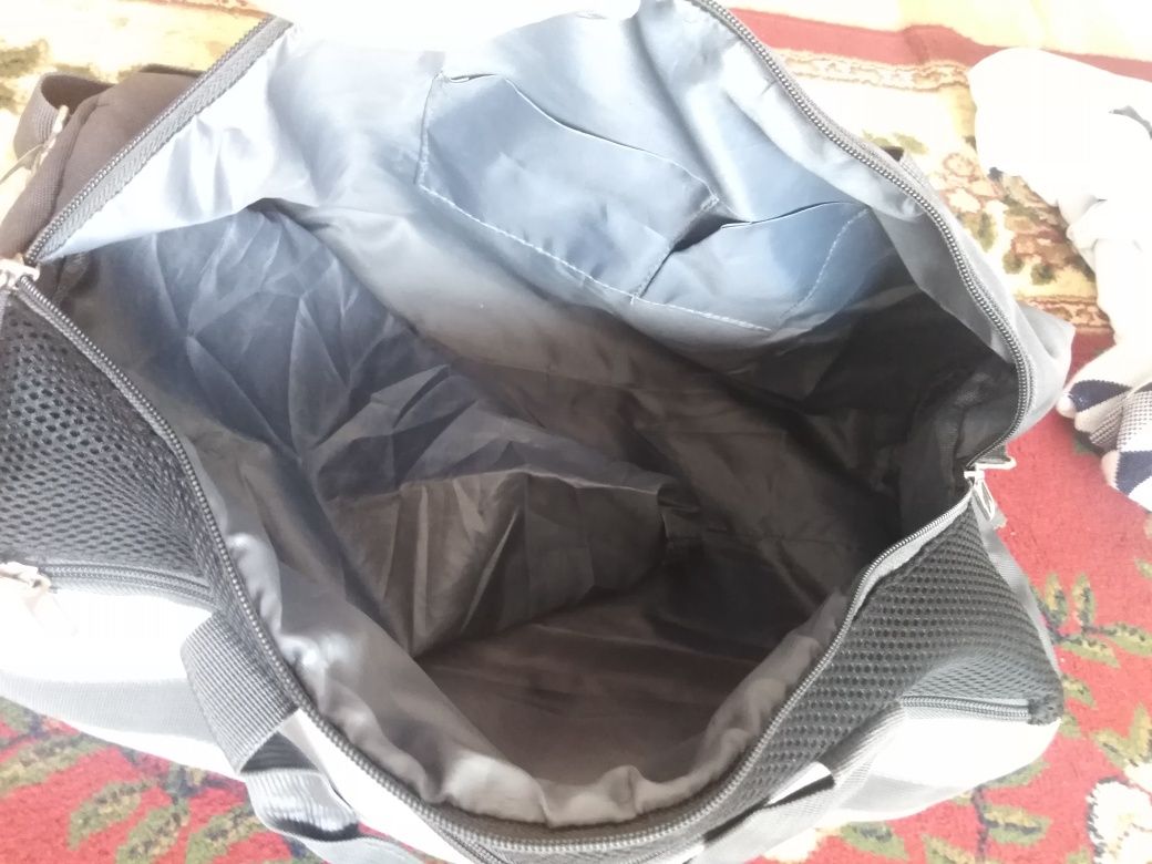 Продам мужскую дорожную сумку (темно серого цвета)
