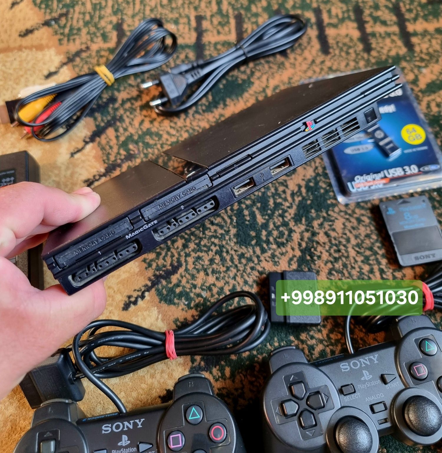 PlayStation 2 slim proshifka qilingan