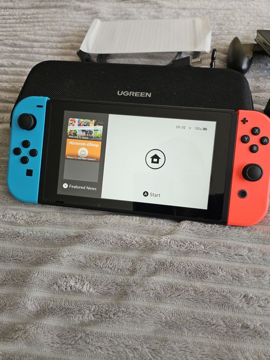 Consola Nintendo Switch+Mario Kart+multe accesorii ca NOUA