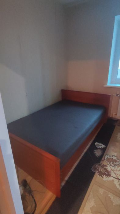 Кровать с подъемным механизмом