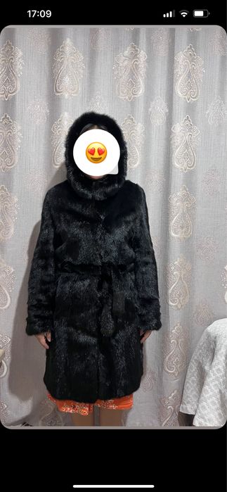 Норковая шуба черного цвета.
