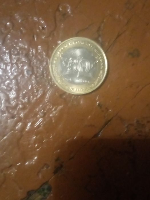 Продаю манету за 10000тг