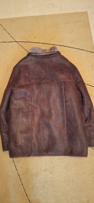 Haine și cojoc piele